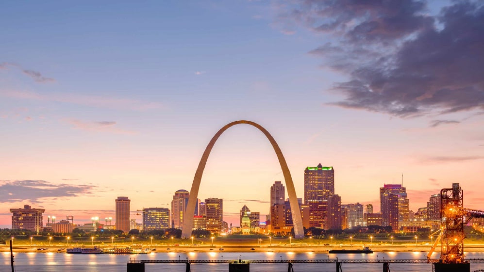 St. Louis, Missouri, USA downtown cityscape on the Mississippi River at twilight.